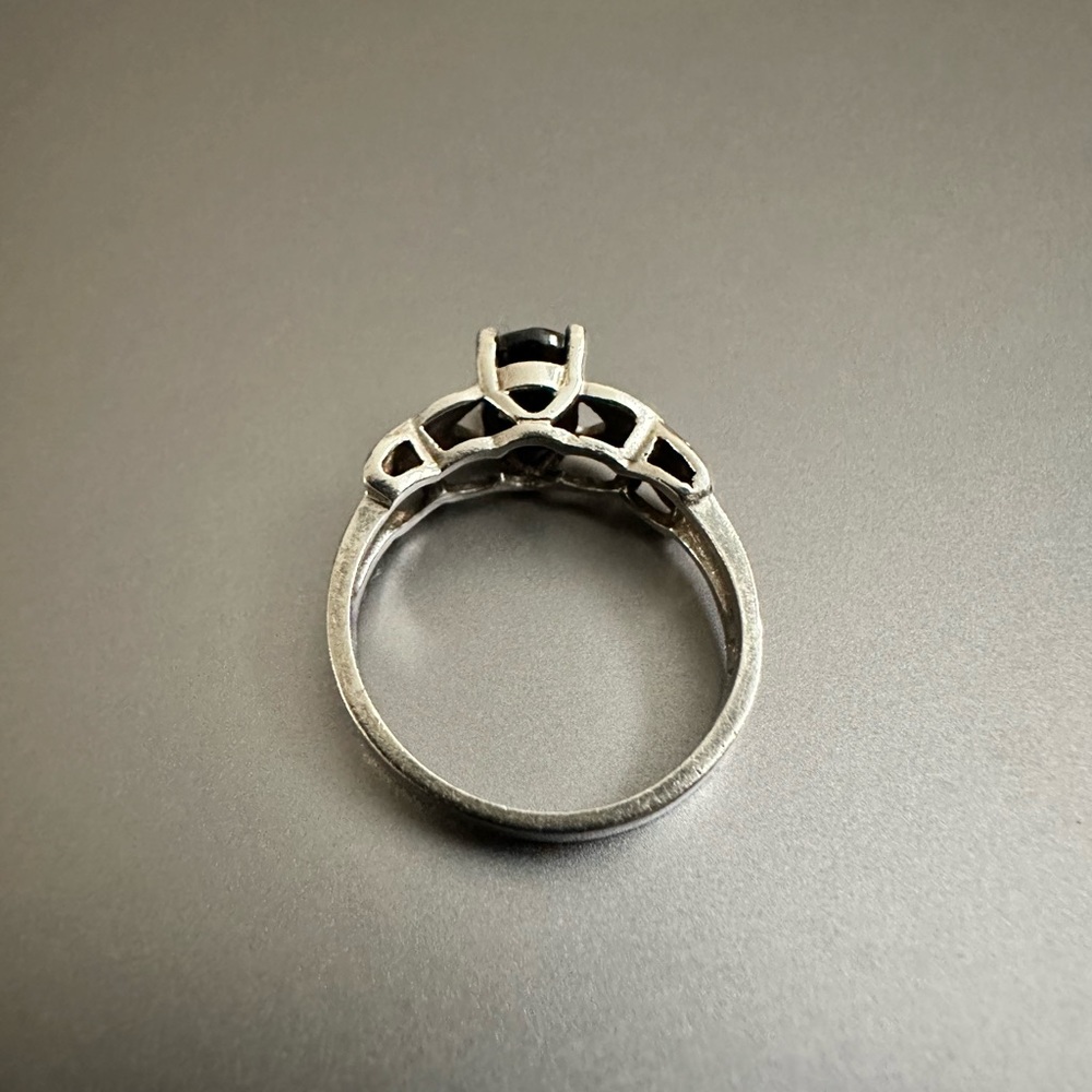 Black onyx faceted stone and silver band ring cathedral and cross design